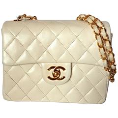 Vintage CHANEL white lambskin flap chain mini shoulder bag, classic 2.55 purse.