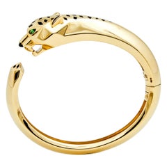 Cartier Bracelet manchette Panthère de Cartier en or 18 carats, tsavorites et laque onyx