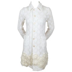 2012 COMME DES GARCONS off-white lace jacket with knit flower detail