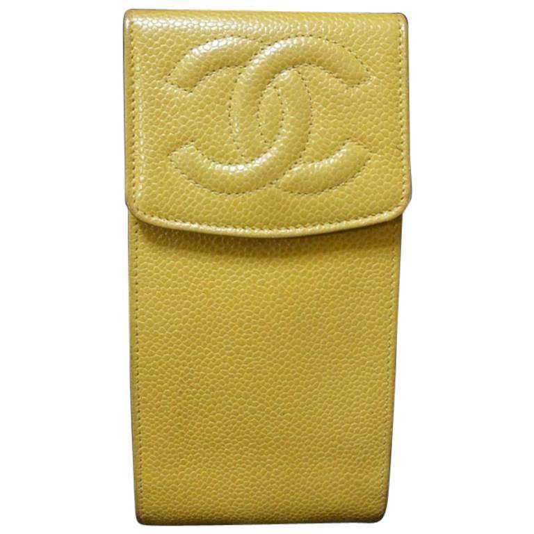Vintage CHANEL yellow caviar phone case, sunglass, cigarettes, pen