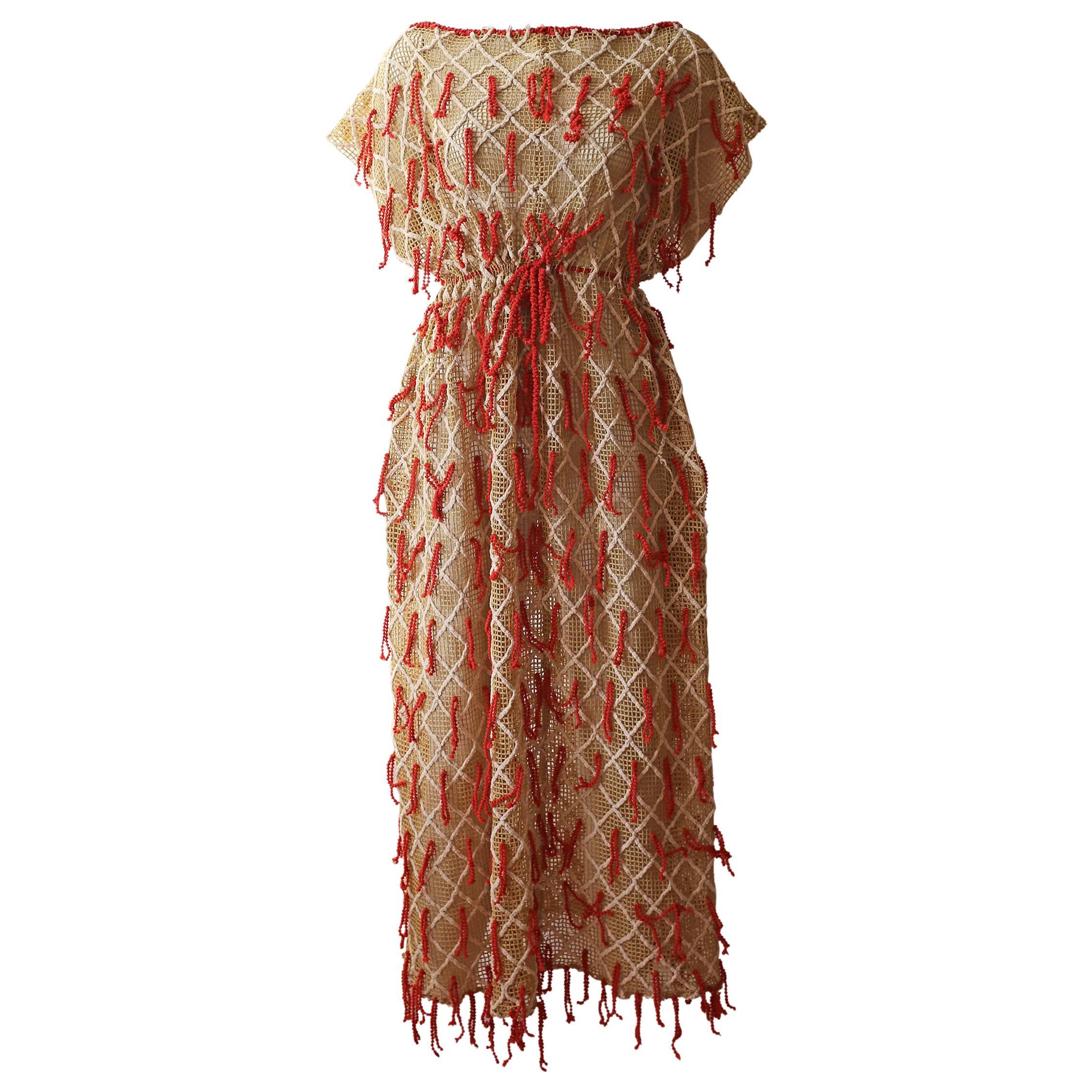 Embroidered netted dress with tassels, c. 1970