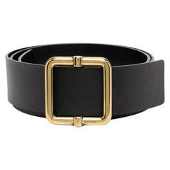 2000s Gucci black leather belt with gold-tone metal buckle