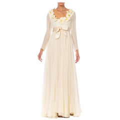 1960S SARMI HAUTE COUTURE Cream Silk Chiffon Gown With Flowers On The Neck Line