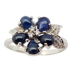 Cabochon Blue Sapphire with Cubic Zirconia Ring set in Silver Settings