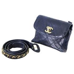 Vintage CHANEL navy leather waist purse, fanny bag with golden chain belt and CC