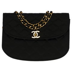 Chanel vintage half moon shoulder flap bag in black quilted satin, GHW