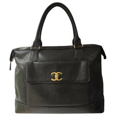 Vintage Chanel black leather handlebag shoulder bag