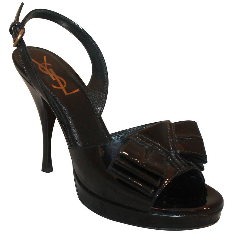 black heels with bow on front
