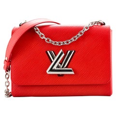 Louis Vuitton Black Epi Leather Twist MM Bag at 1stDibs