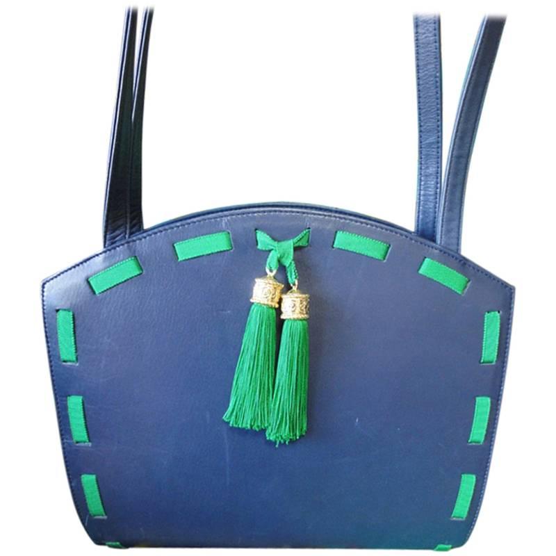 Vintage MOSCHINO navy leather tote bag with green tape trimming and fringes.