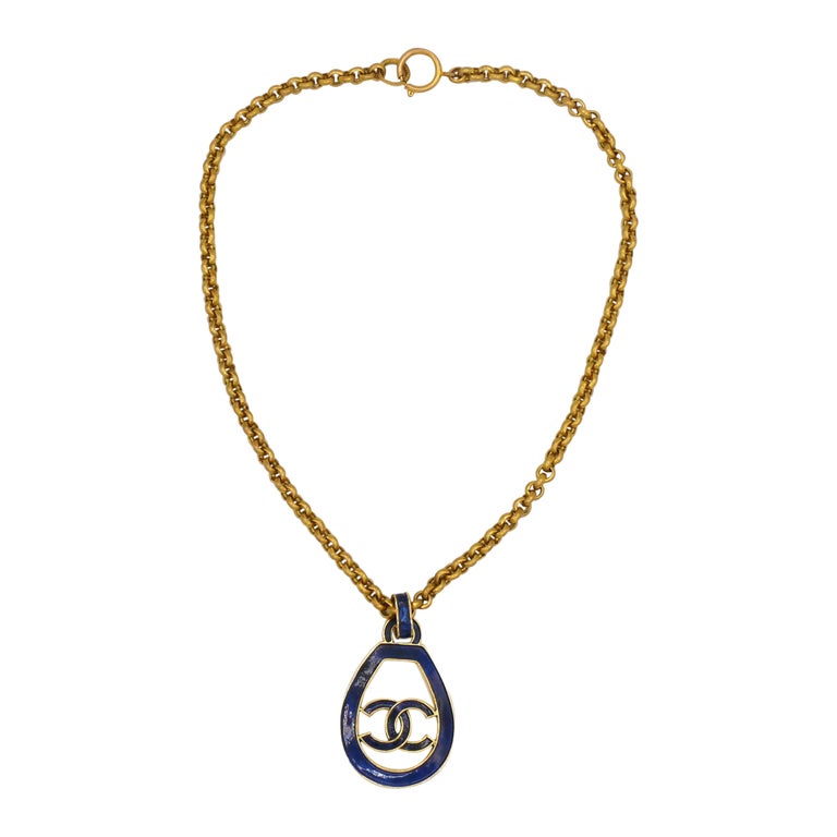 Chanel Vintage Gold Toned Blue Logo Pendant Necklace, 1993 For