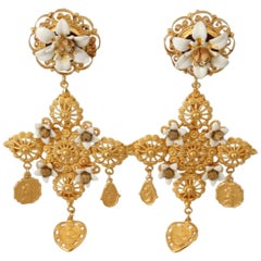Dolce & Gabbana gold clip-on dangling cross motive metal earrings 