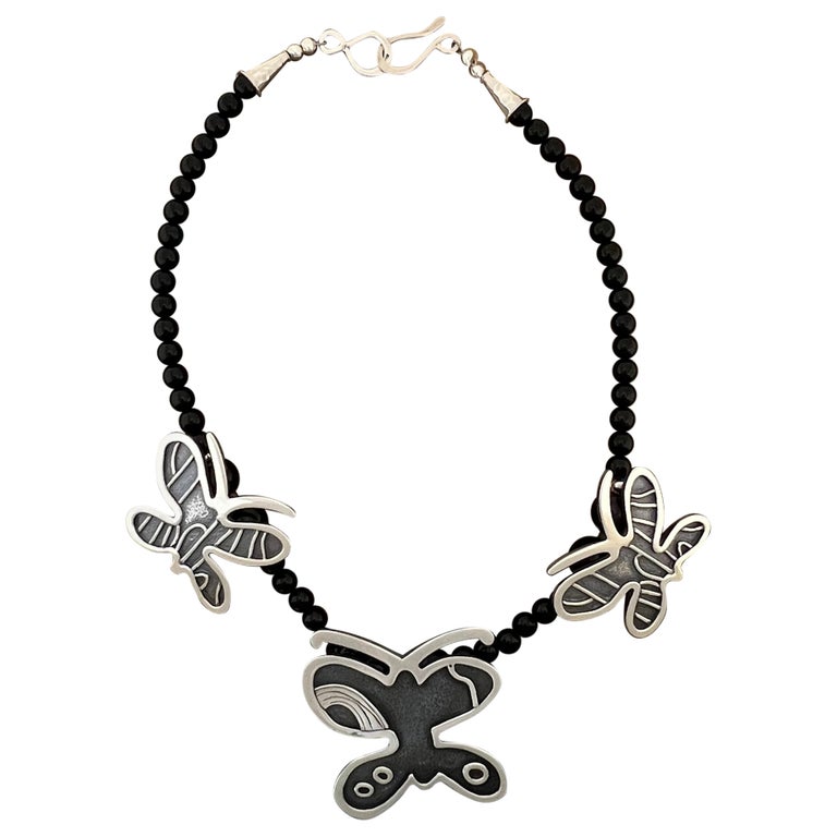 Butterflies necklace designed by Melanie A. Yazzie, Navajo, silver, onxy beads For Sale