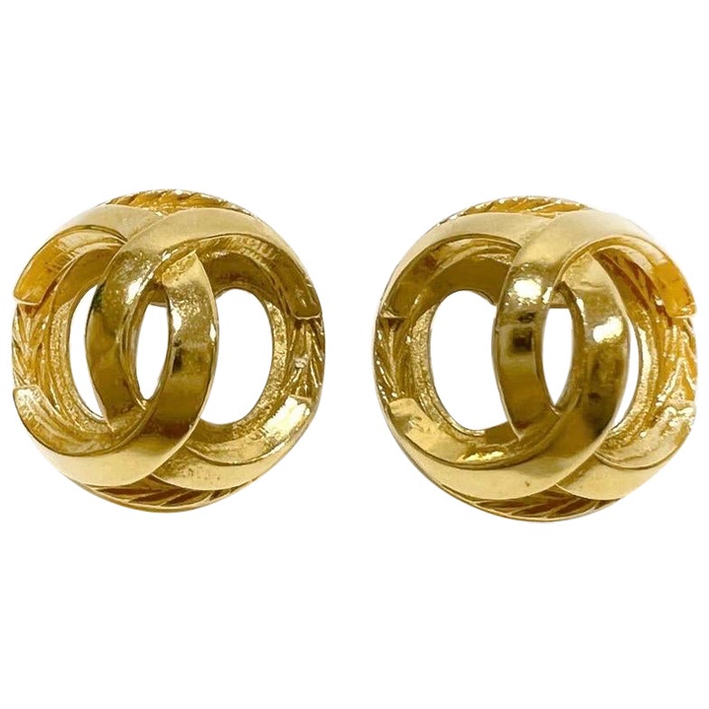 Vintage Gold Tone Chanel Dangling Disc with Double CC Circa 1980s