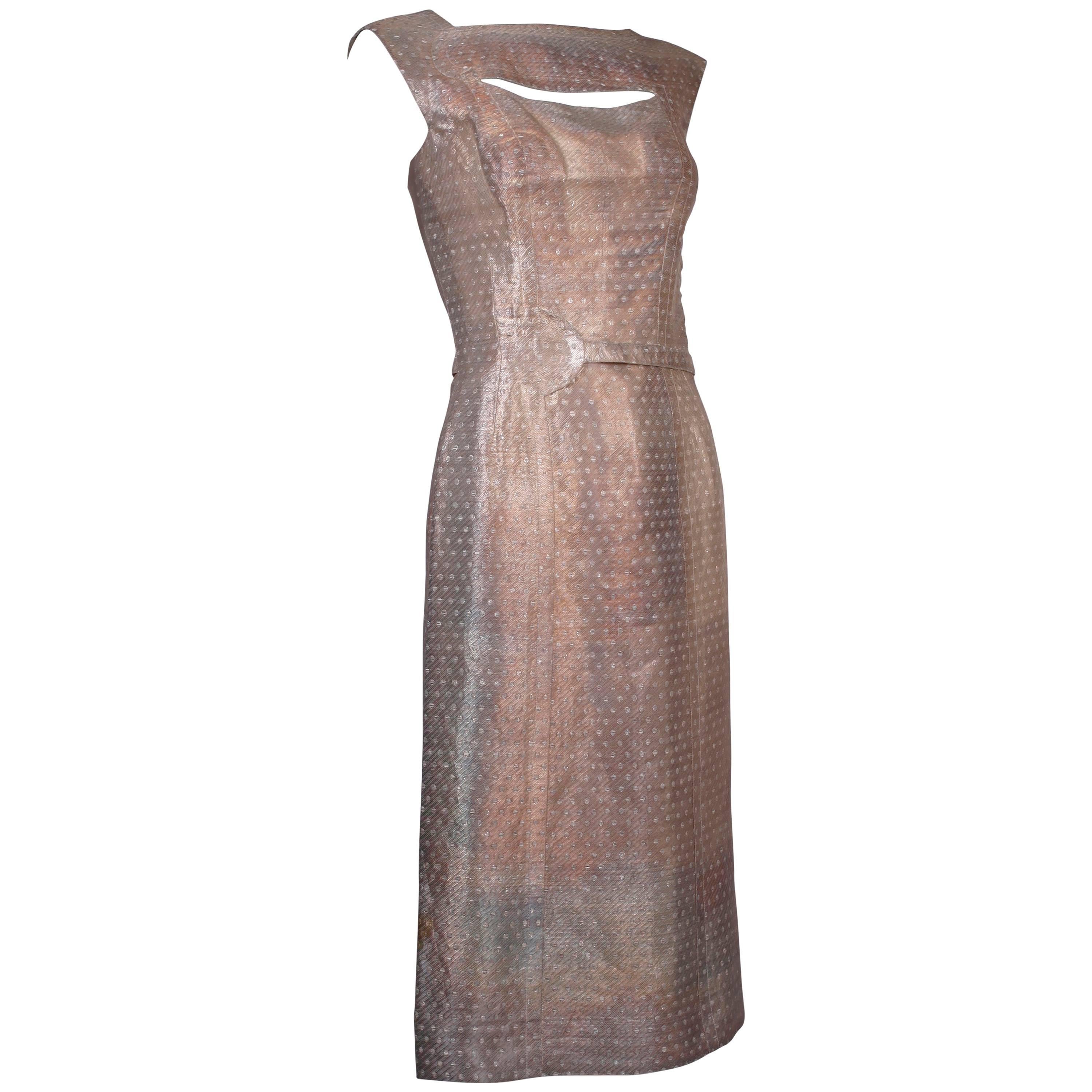 Fontana Sisters haute couture cocktail dress made with metallic thread - the thread has oxidized, giving the dress it's unusual, amazing look. Has panel with rounded edge detail across the top of the bust and that same motif as a belt around the