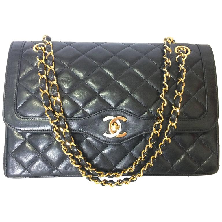 MINT. Vintage Chanel black 2.55 classic double flap purse, gold