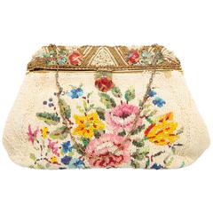 Antique 1920s fully beaded bag with floral pattern enamel handle with small pearls  