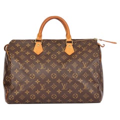 LOUIS VUITTON Brown Monogram Coated Canvas & Vachetta Leather Used Speedy 35