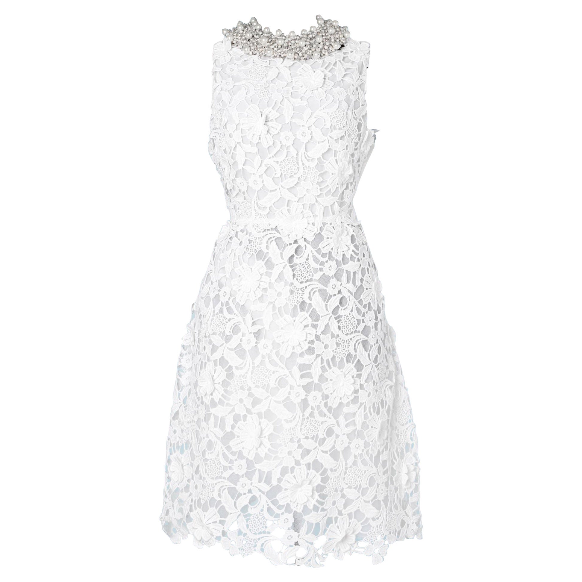 White guipure dress on silk and tulle lining. Valentino For Sale