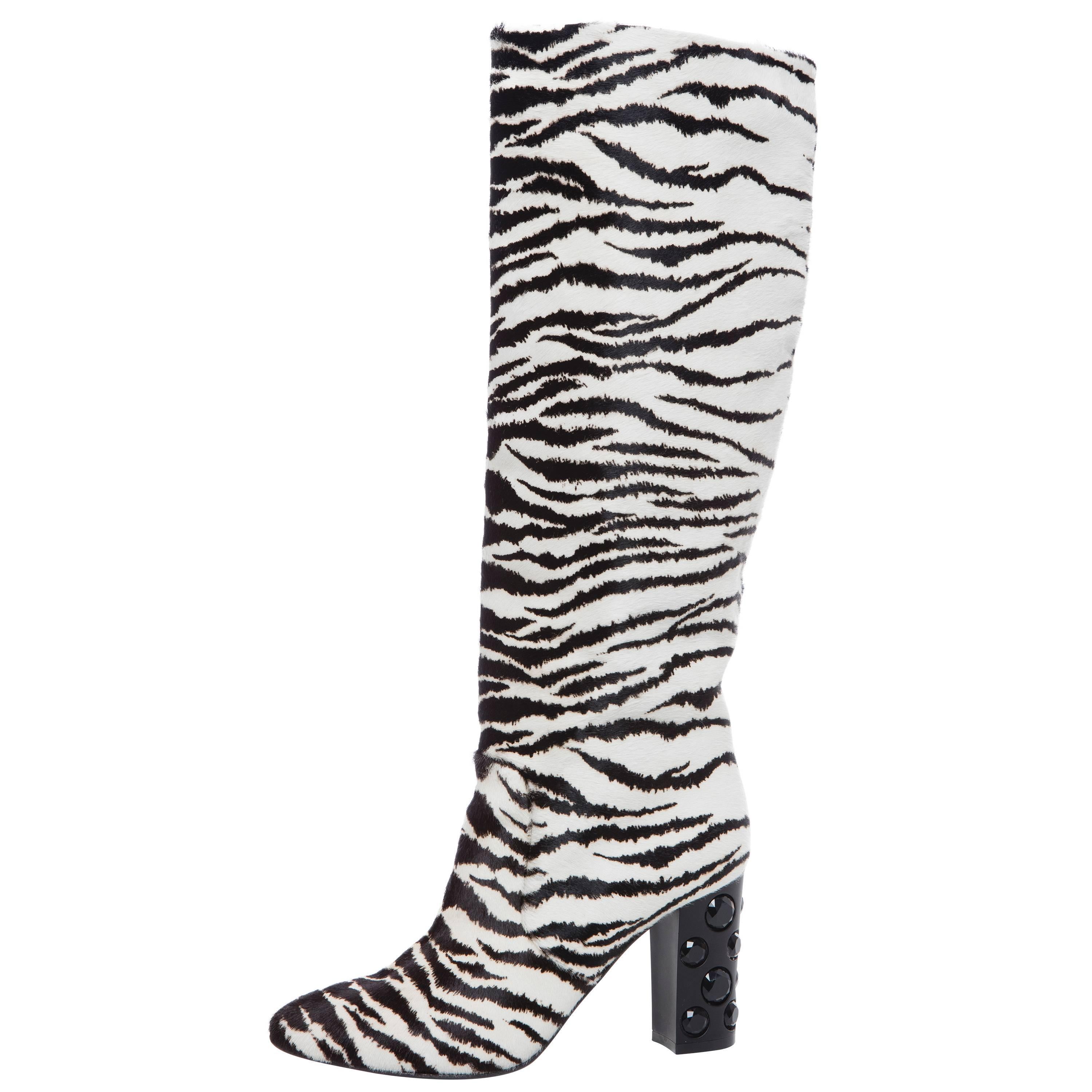  Lanvin, Pre-Fall 2010 round toe boots with zebra print throughout, tonal stitching and jewel embellishments at resin heels.

IT. 39
US. 9
Calf Circumference 15”, Shaft 16”, Heels 3.25”