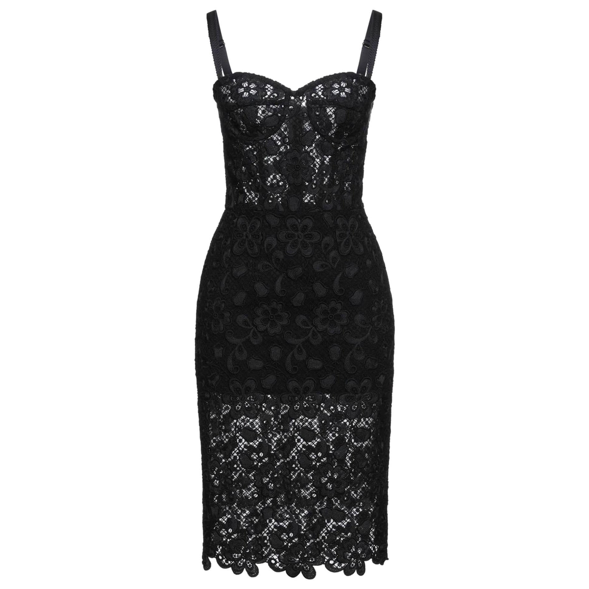 Dolce & Gabbana sleeveless sheath dress is
overlaid in delicate floral lace