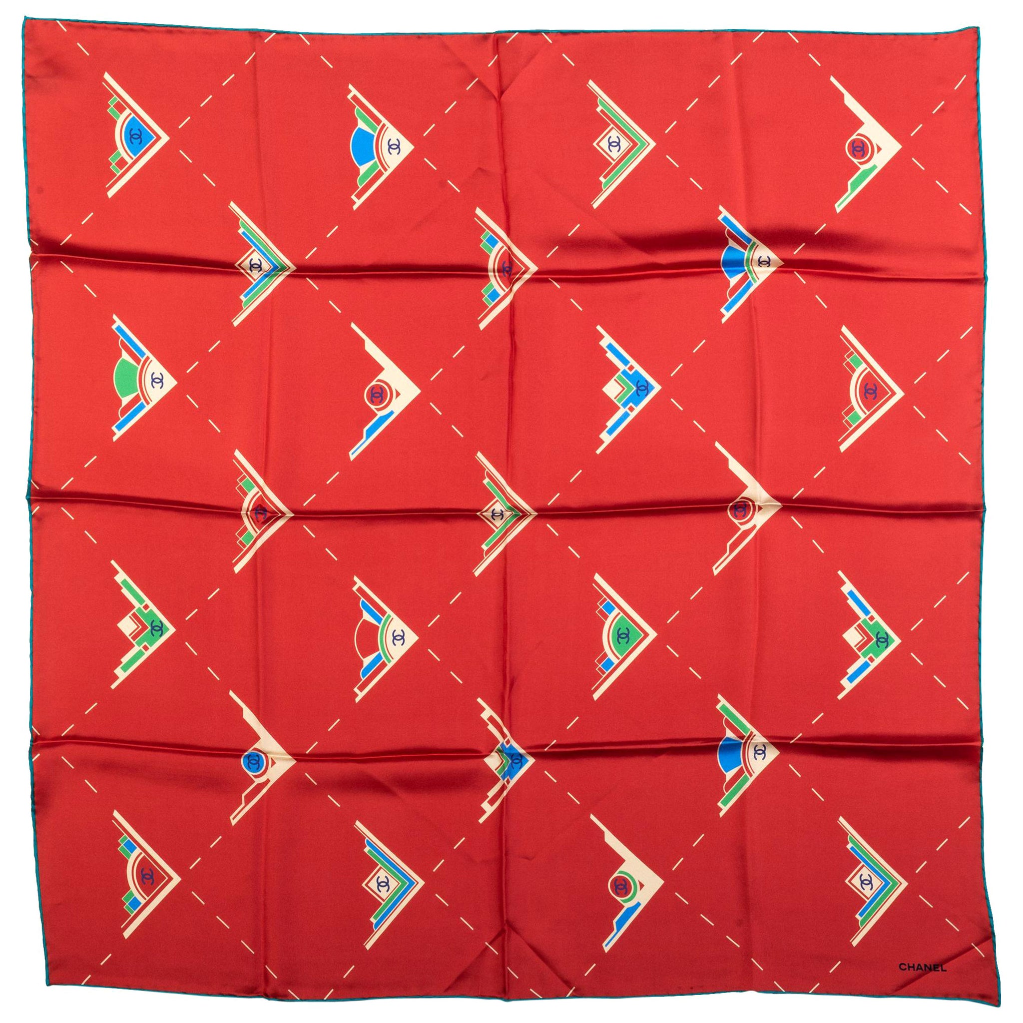 Chanel - Écharpe en soie rouge avec logo géométrique, état neuf