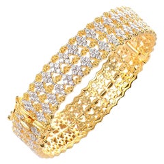 Bracelet jonc fabuleux en or jaune et argent vermeil avec motif de diamants bicolores