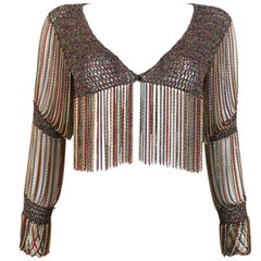 Loris Azzaro knitted cropped cardigan with chain mail sleeves and trim, c. 1970s