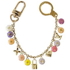 LOUIS VUITTON Logo Bag Charm Pastilles Gold and Pastels