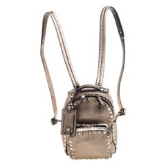 Valentino - Mini sac à dos Rockstud en cuir marron clair métallisé