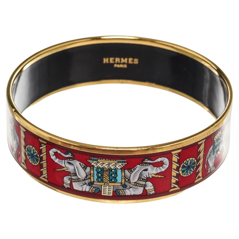 Hermes Enamel Torana Elephants Bracelet gold-tone rim, red background