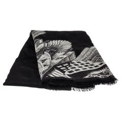 Louis Vuitton Black Shawl with white skyline motif is made of silk and wool.    