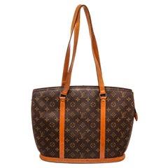 Louis Vuitton Brown Babylone Totes Bag with monogram canvas, gold-tone hardware