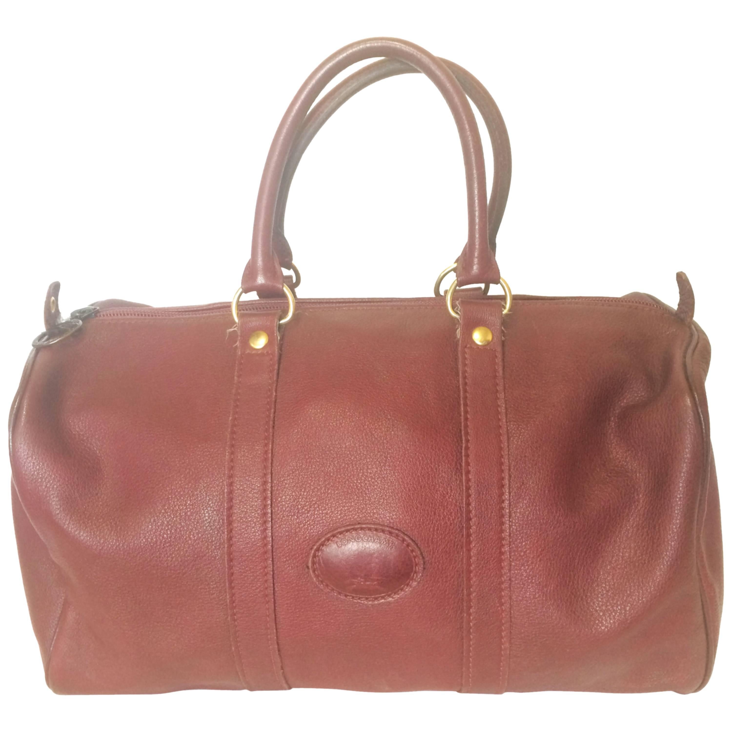 80's Vintage Longchamp rare dark wine leather duffle bag, mini travel purse.  For Sale