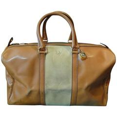 Vintage Christian Dior Bagages camel brown duffle purse, travel bag. Unisex bag.