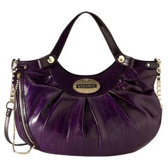 NUOVA BORSA IN PELLE VERSACE AMETHYST EEL con PORTAFOGLIO IN TONI D'ORO