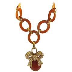 1980's Nina Ricci Amber Hued Lucite Chain-Link Necklace with Jeweled Pendant