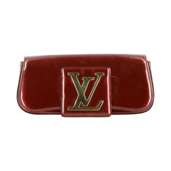 Louis Vuitton Sobe Patent Leather Clutch in Burgundy