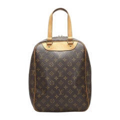 Louis Vuitton Monogram Excursion Handbag in Monogram Leather and Cotton lIning