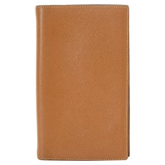 Hermes Camel Leather Flip Wallet with gold-tone hardware,  brown leather trim