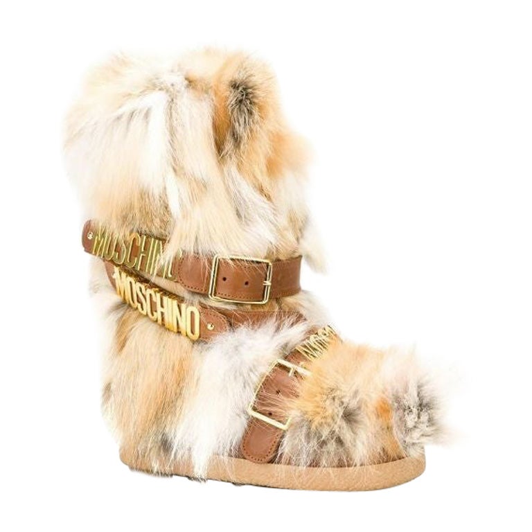 Bottes de neige à boucles en cuir et fourrure de renard Moschino Couture x Jeremy Scott AW15 en vente