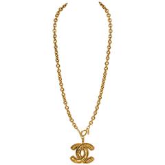 Chanel Quilted CC Logo Pendant Necklace at 1stDibs  cc pendant, chanel  pendant necklace, chanel logo pendant necklace
