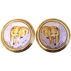 Vintage Hermes cloisonne golden round earrings with female lion design.
