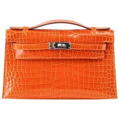 HERMES Kelly Pochette Clutch Bag Orange Feu Porosus Crocodile Palladium Rare 