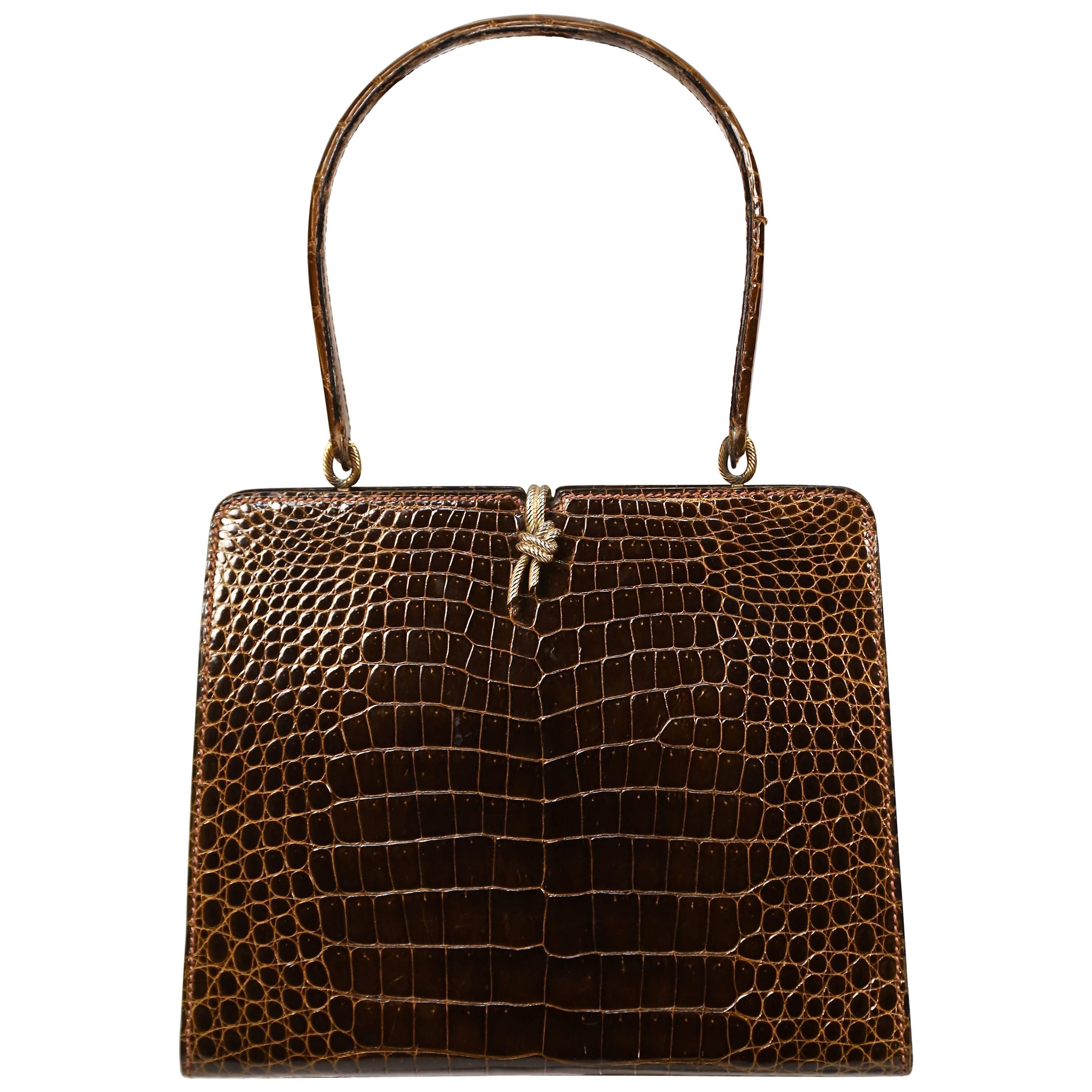 1960's LOEWE brown crocodile leather top handle bag with gilt hardware