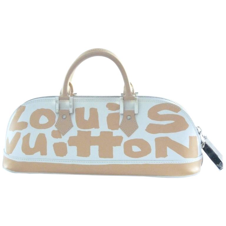 Louis Vuitton Long Alma Graffiti bag For Sale at 1stDibs