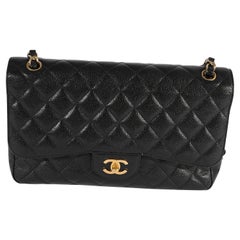 Chanel Schwarze gesteppte Kaviar Jumbo Classic Tasche mit doppelter Klappe