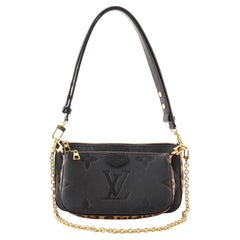 Louis Vuitton Multi Pochette Accessoires Wild at Heart Monogram Empreinte Giant