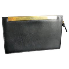 YSL Clutch-Handtasche aus schwarzem Leder, goldfarbene Handtasche
