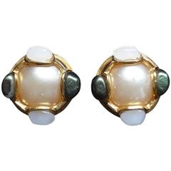 Vintage CHANEL gold tone earrings with a faux pearl, white and green faux stones